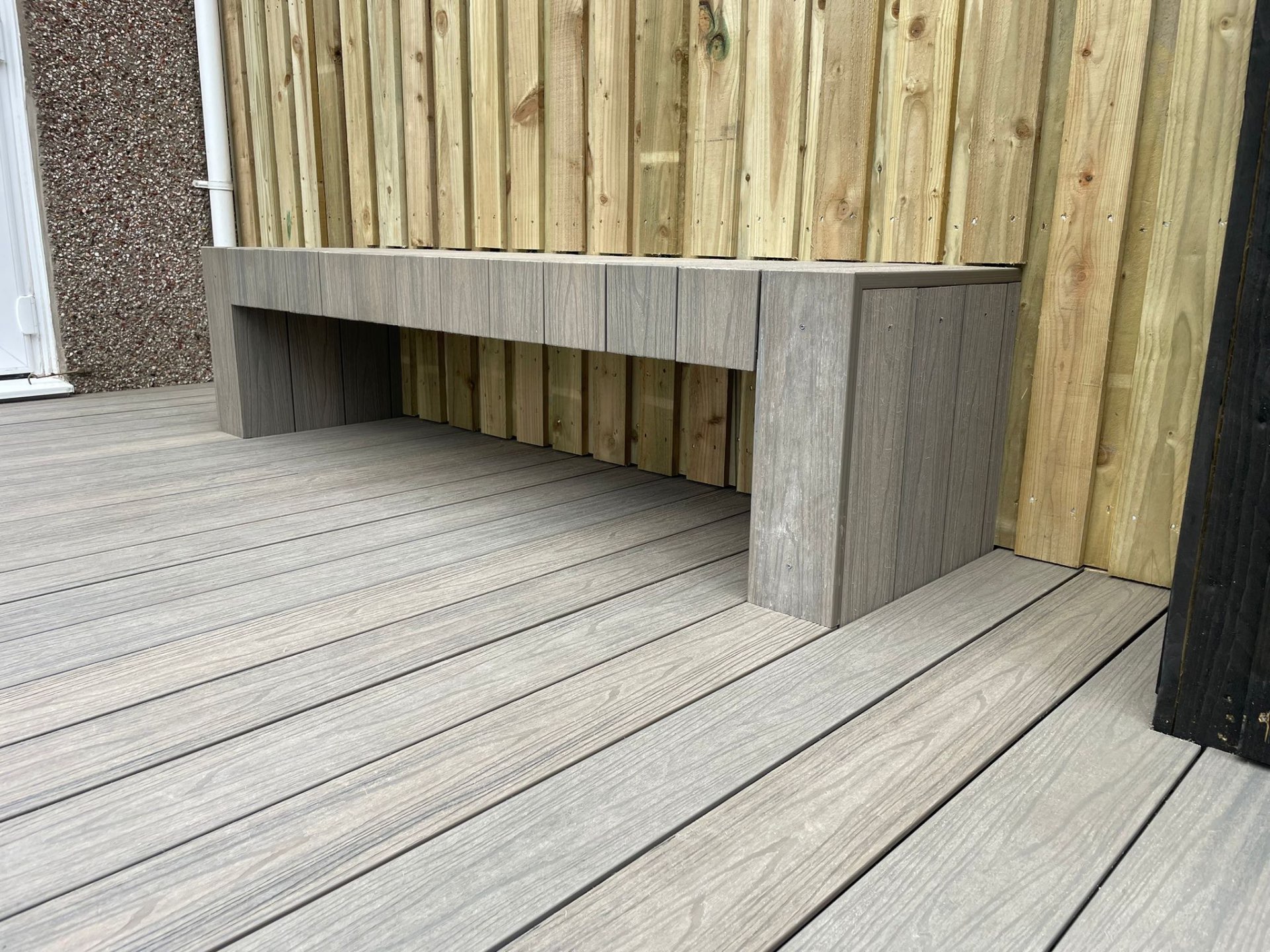 Composite decking with built-in seating