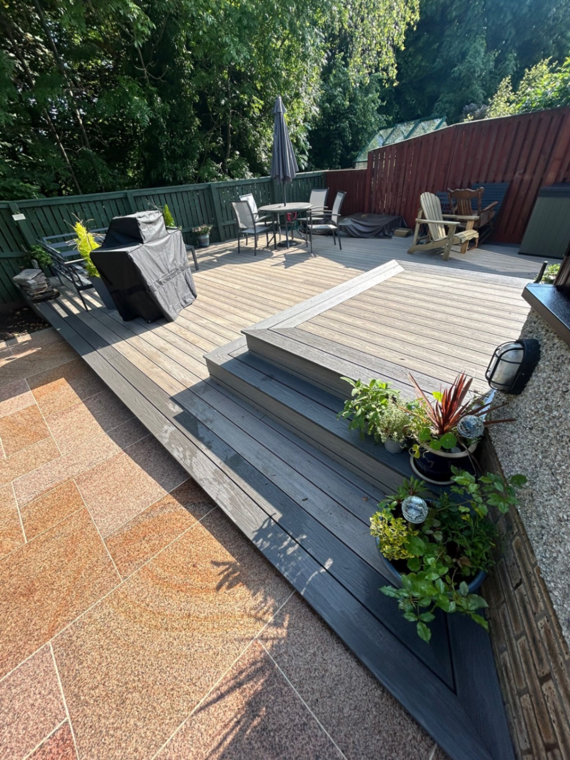 Multi-level deck Scotland showing different composite brands Trex TimberTech Millboard tones