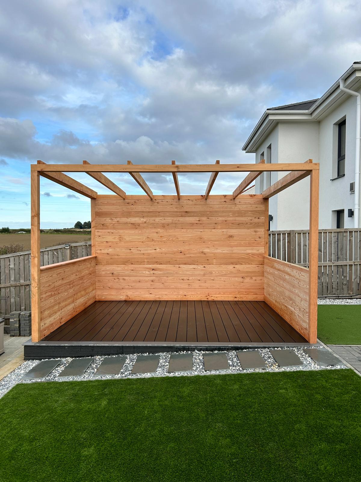 Composite decking with integrated timber pergola in a modern Scottish garden