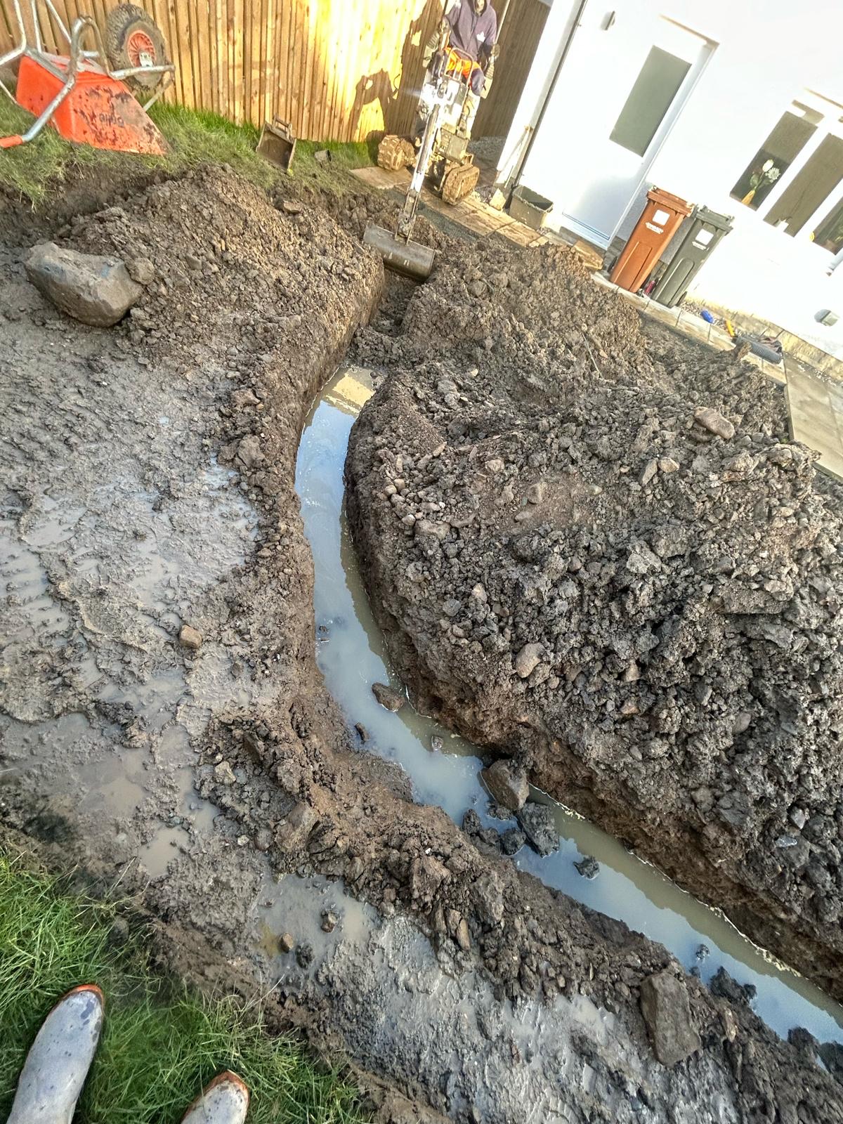 Clay soil excavation for drainage in Bathgate