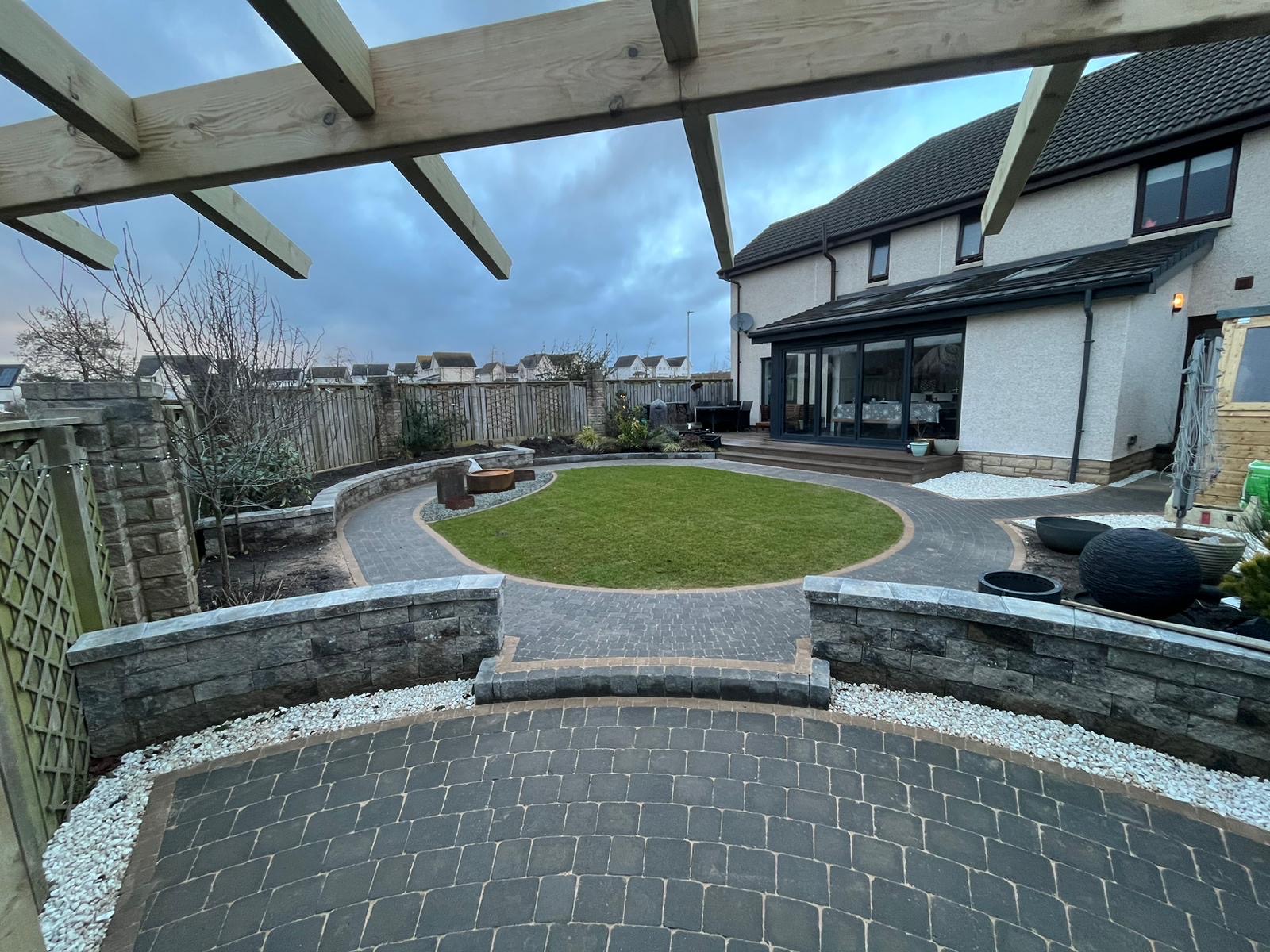 Pergola View with Curved Paving & Real Grass