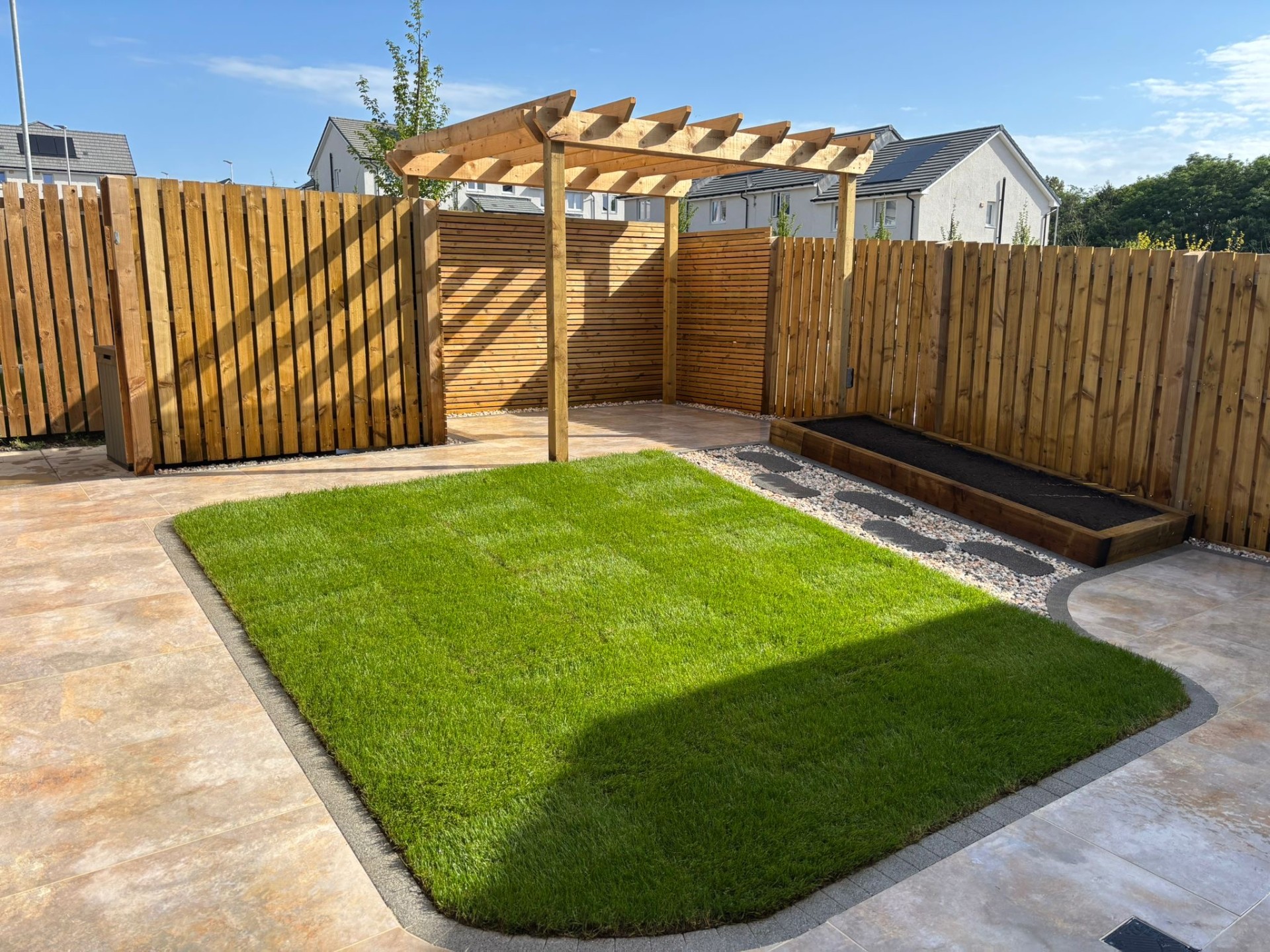 West Craigs Garden Transformation — Porcelain, Pergola & Turf