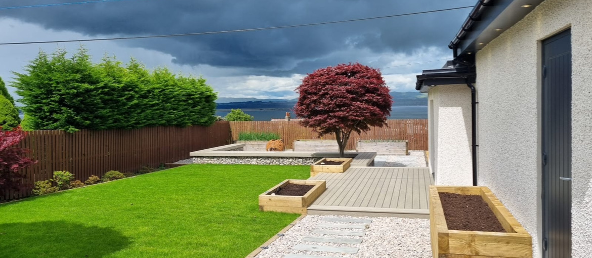 Modern garden raised beds with decking