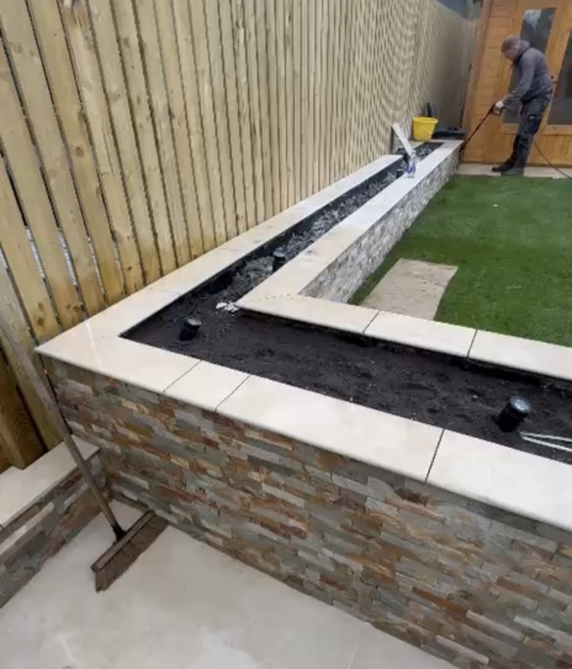 Garden raised bed with integrated ACO drainage installation preventing waterlogging in Scottish climate