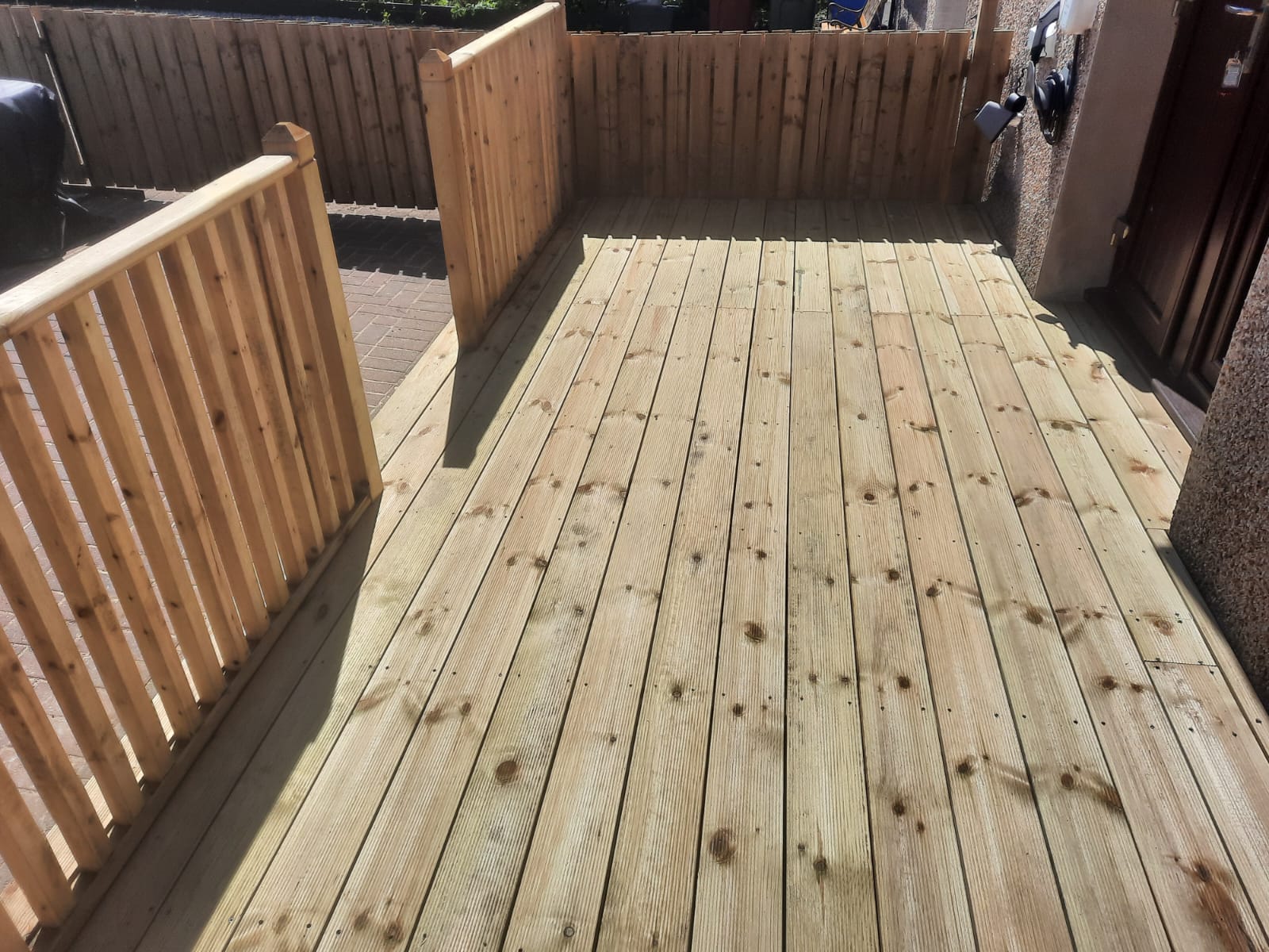 Premium timber decking with balustrade in Edinburgh area coastal property