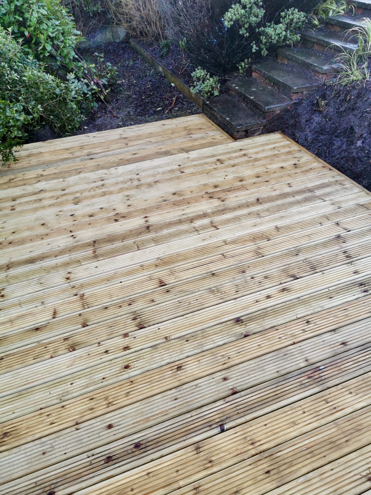 Timber decking with steps installation in South Queensferry garden with professional finish
